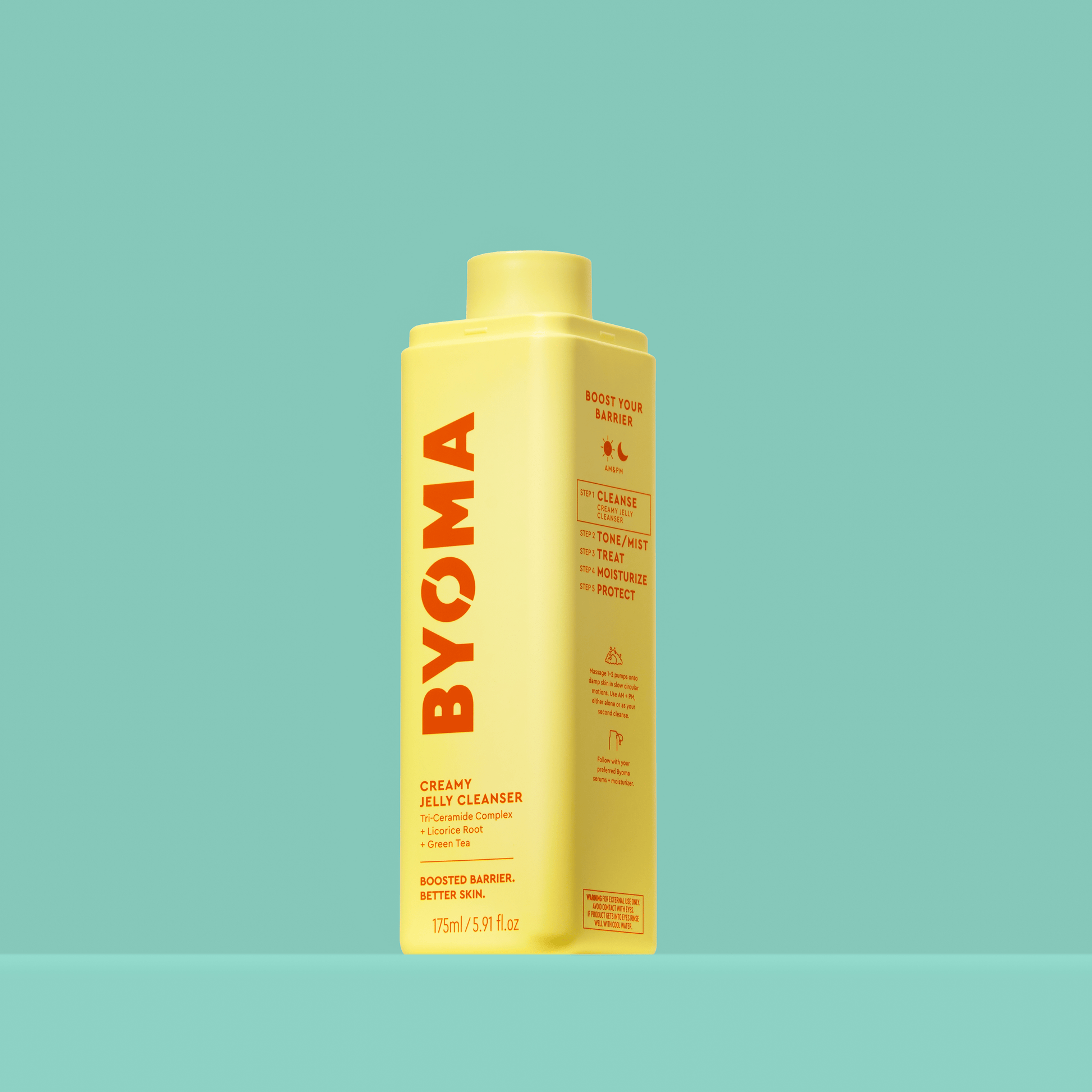 BYOMA Creamy Jelly Cleanser in a yellow bottle with the cap removed.