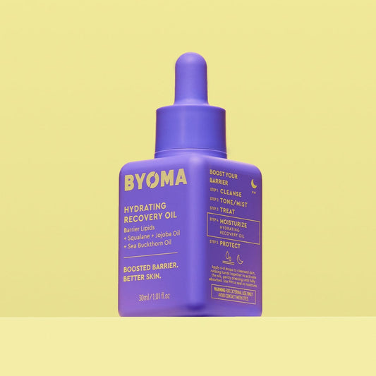 BYOMA Hydrating Recovery Oil in a bold purple bottle.