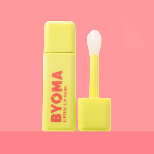 BYOMA Liptide Lip Mask in a vibrant yellow bottle.