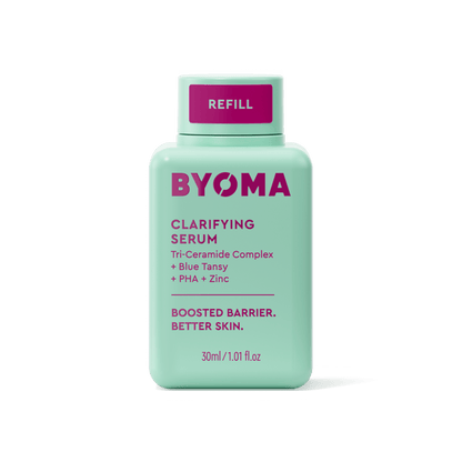 A BYOMA Clarifying Serum refill bottle in mint green.