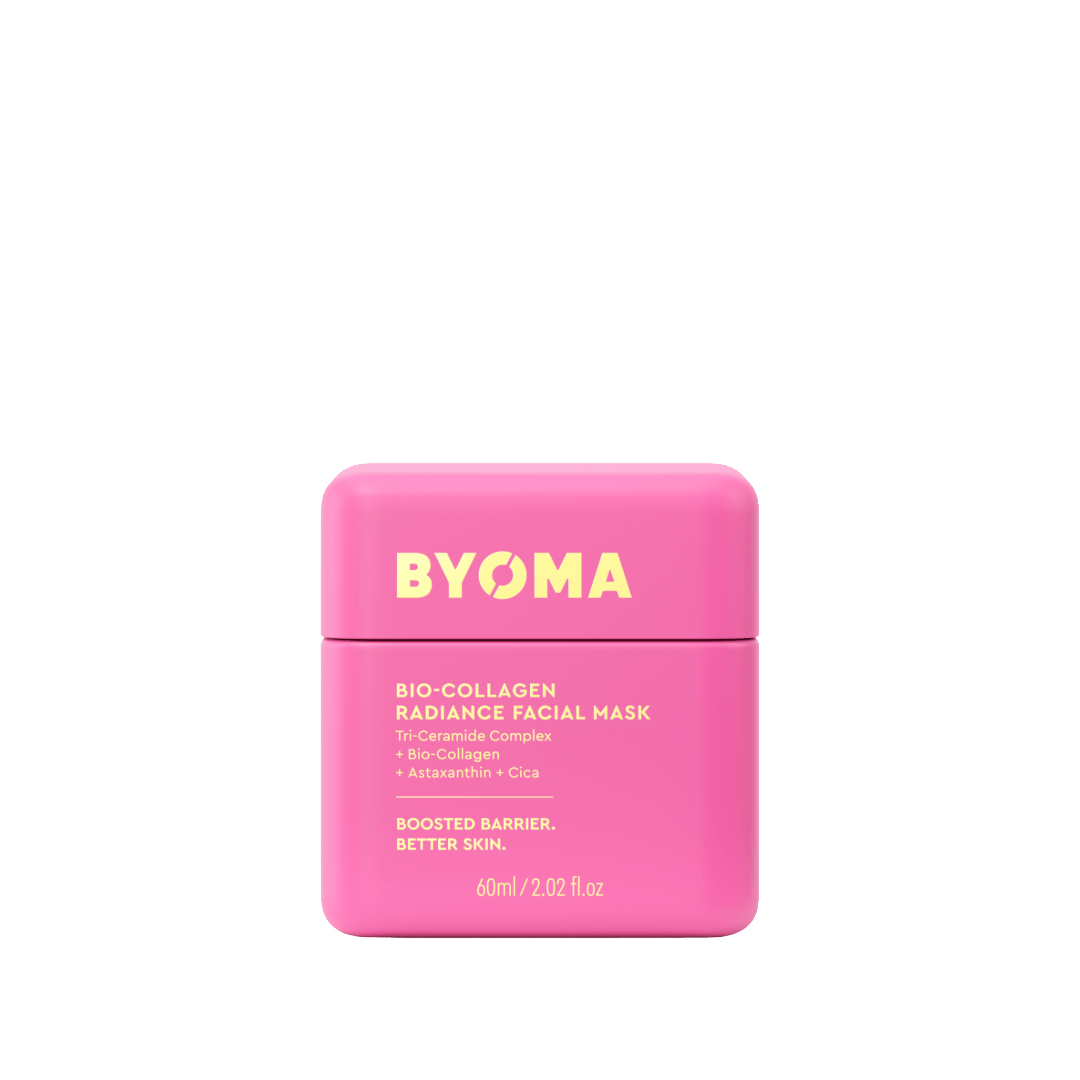 Pink facial mask container with 'BYOMA' branding on a green background