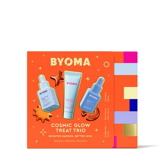 BYOMA Cosmic Glow Treat Trio packaging on an orange background