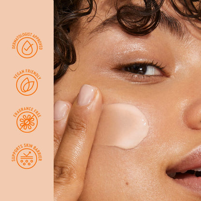 Close-up of a person applying cream to their face with a beige background and icons indicating product features.