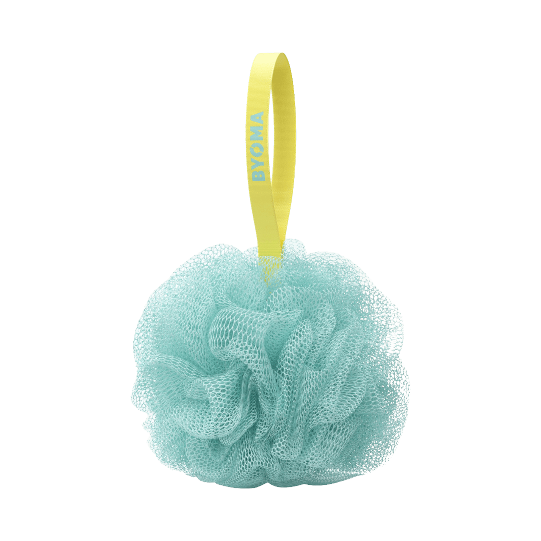 Green bath pouf with a yellow handle on a transparent background