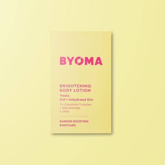 BYOMA brightening body lotion packaging on a yellow background